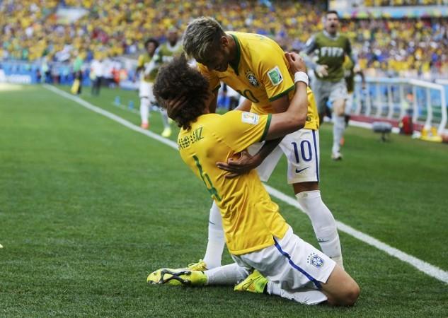 David Luiz celebrates with Neymar after scoring the opening goal in the Brazil vs Chile last 16 FIFA World Cup 2014 encounter, 28 June David Luiz Brazil Neymar