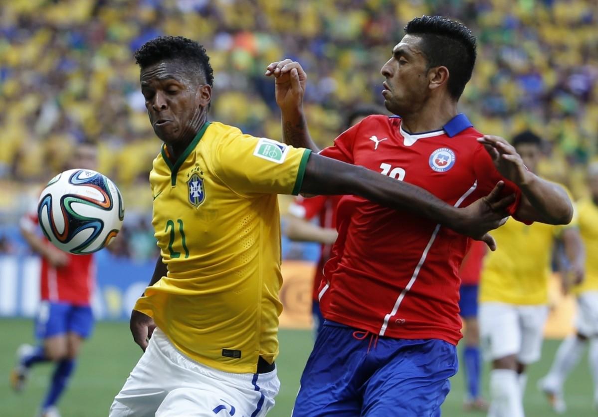 Brazil's Jo fights for the ball with Chile's Jara during their 2014 World Cup round of 16 game at the Mineirao stadium in Belo Horizonte Brazil v Chile