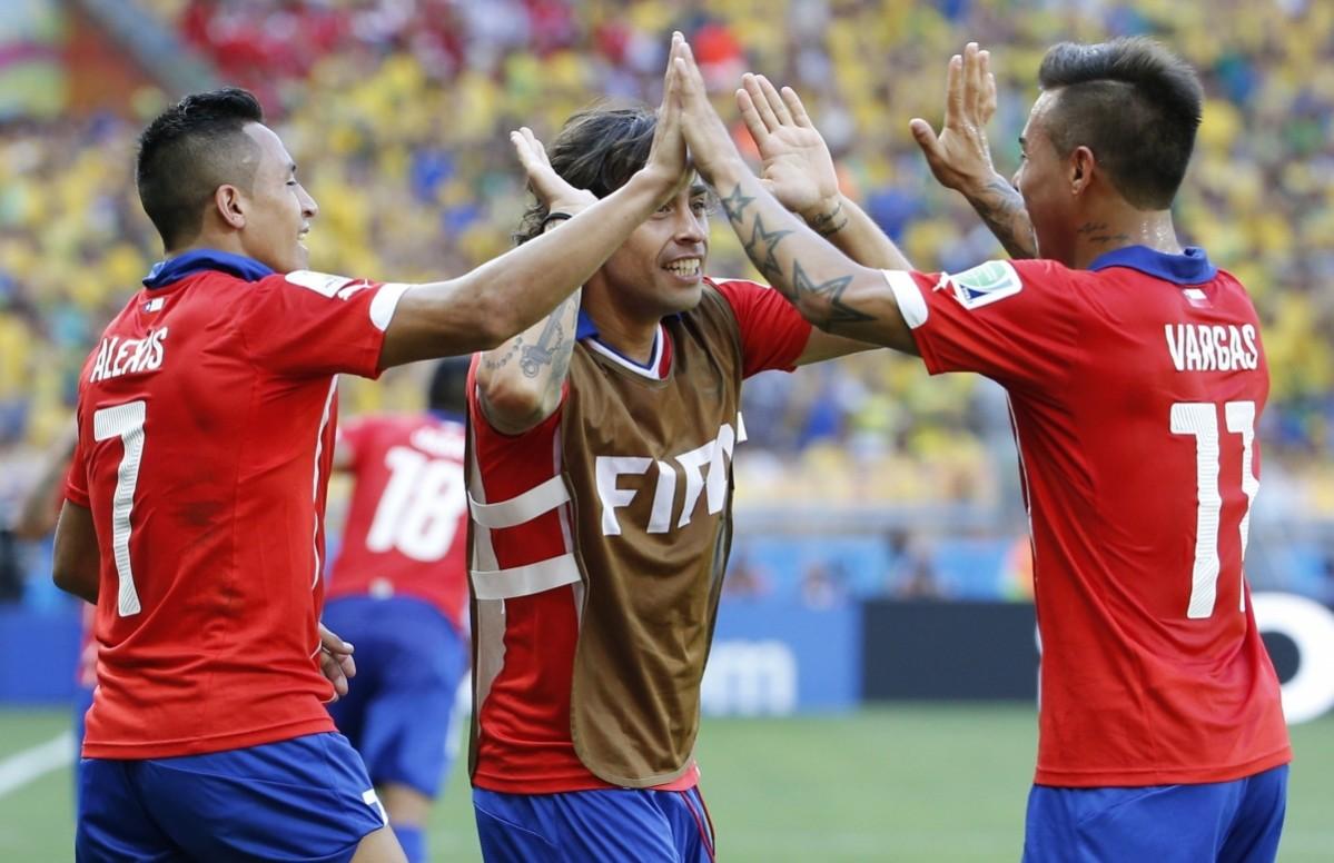 Chile's Sanchez celebrates his goal with teammates Valdivia and Vargas during their 2014 World Cup round of 16 game against Brazil at the Mineirao stadium in Belo Horizonte Brazil v Chile