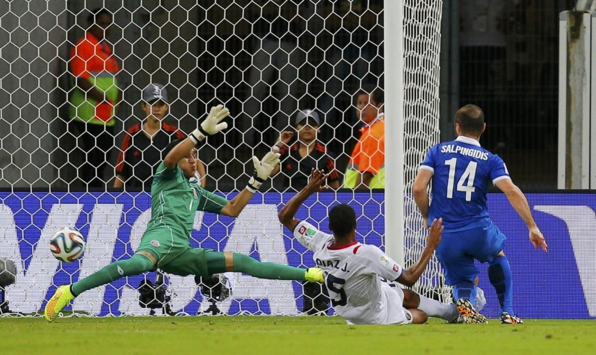 Costa Rica's goalkeeper Navas makes a save on a shot by Greece's Salpingidis during their 2014 World Cup round of 16 game at the Pernambuco arena in Recife Costa Rica vs Greece