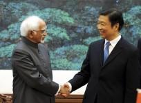 Hamid Ansari shaking hands with China's Vice President Li Yuanchao