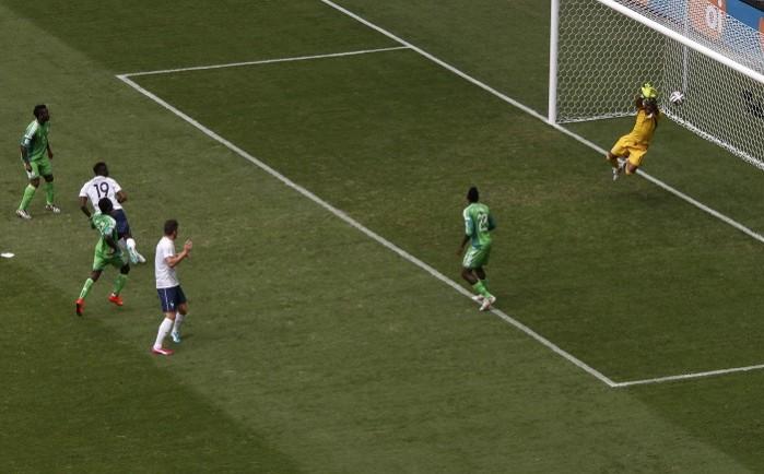 Nigeria goalkeeper Vincent Enyeama makes a brilliant reflex save to deny France midfielder Paul Pogba in the first half Paul Pogba France Vincent Enyeama Nigeria