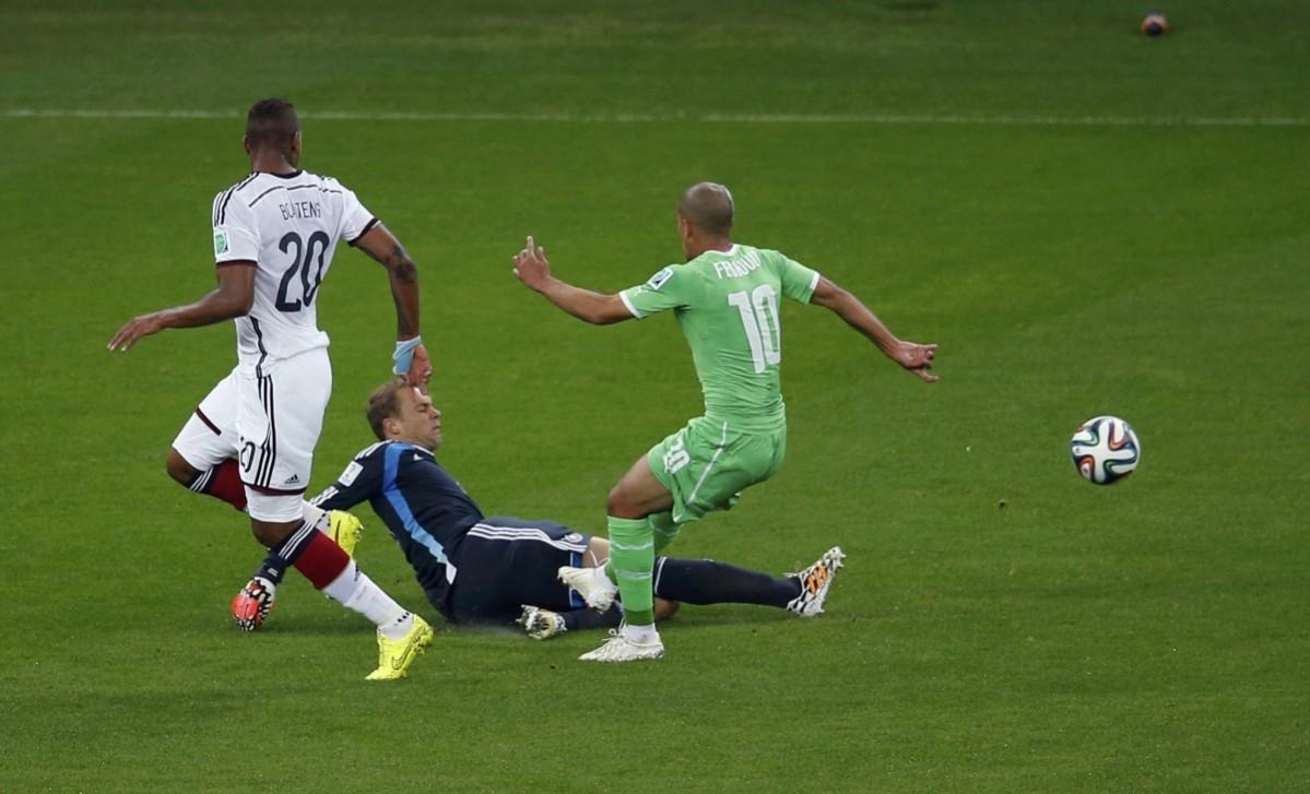 Germany's goalkeeper Neuer saves the ball during the 2014 World Cup round of 16 game between Germany and Algeria at the Beira Rio stadium in Porto Alegre Germany vs Algeria