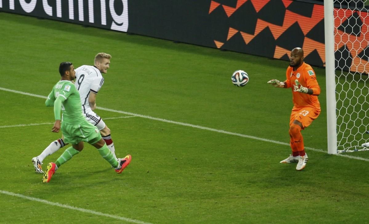 Germany's Schuerrle scores against Algeria during their 2014 World Cup round of 16 game at the Beira Rio stadium in Porto Alegre Germany vs Algeria
