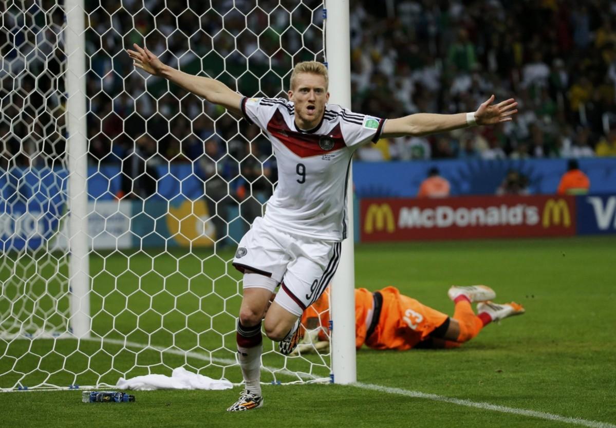 Germany's Schuerrle celebrates his goal against Algeria during extra time in their 2014 World Cup round of 16 game at the Beira Rio stadium in Porto Alegr Germany vs Algeria