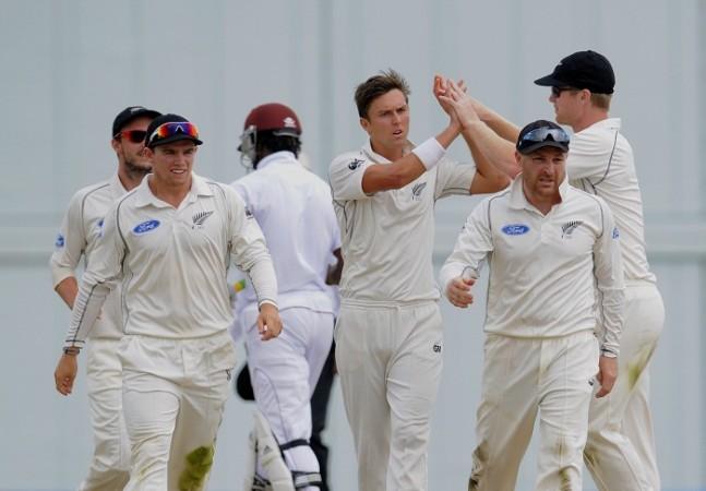 New Zealand pacer Trent Boult celebrates with teammates. Trent Boult