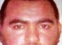 File photo shows image of Abu Bakr al-Baghdadi, commander of the Islamic State in Iraq and the Levant