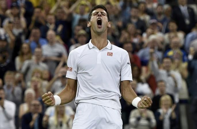 Novak Djokovic of Serbia reacts after defeating Jo-Wilfried Tsonga of France. Novak Djokovic