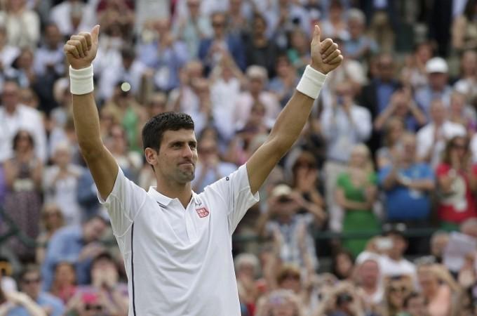 Novak Djokovic of Serbia reacts after defeating Marin Cilic of Croatia. Novak Djokovic