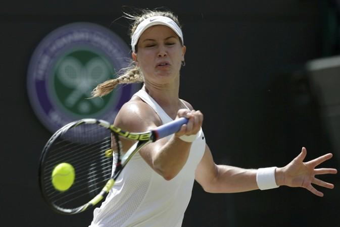 Eugenie Bouchard hits a return against Angelique Kerber. Eugenie Bouchard