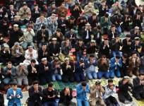 Muslims pray at a mosque in Xinjiang region