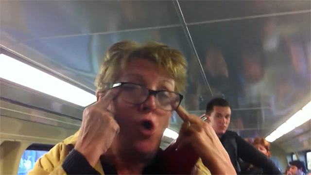 Sue Wilkins pulls up her eye at the Asian woman, whom she called a 'gook'.