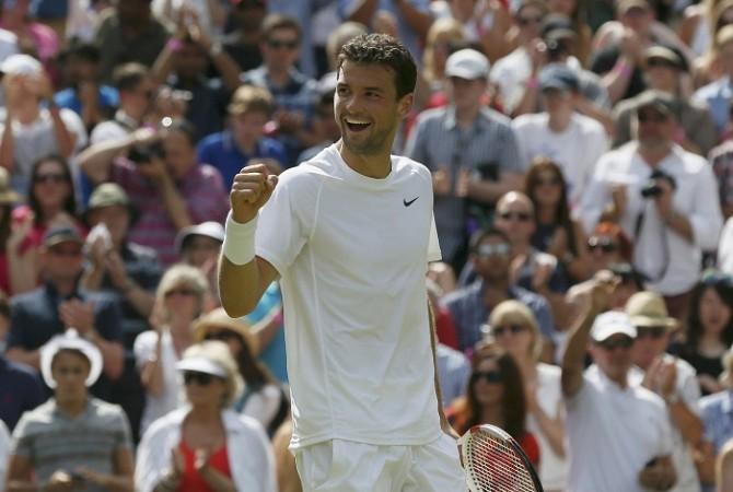 Grigor Dimitrov of Bulgaria reacts after defeating Andy Murray of Britain. Grigor Dimitrov