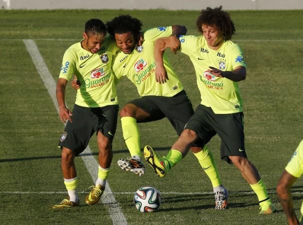 Brazil players Neymar, Marcelo and David Luiz have some fun during a training session Brazil Neymar Marcelo David Luiz