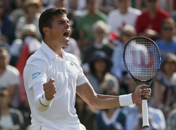 Milos Raonic of Canada reacts after defeating Kei Nishikori of Japan. Milos Raonic