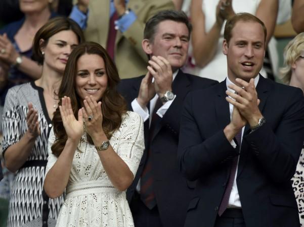 Britain's Prince William and his wife Catherine, Duchess of Cambridge applaud on Centre Court after the men's singles quarter-final tennis match between Roger Federer and Stanislas Wawrinka at the Wimbledon Tennis Championships, in London Kate Middleton, Prince William