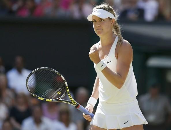 Eugenie Bouchard of Canada reacts after defeating Simona Halep. Eugene Bouchard