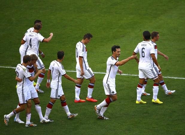 Germany defender Mats Hummels celebrates with teammates after scoring the winner against France in their FIFA World Cup 2014 quarterfinal Germany Mats Hummels