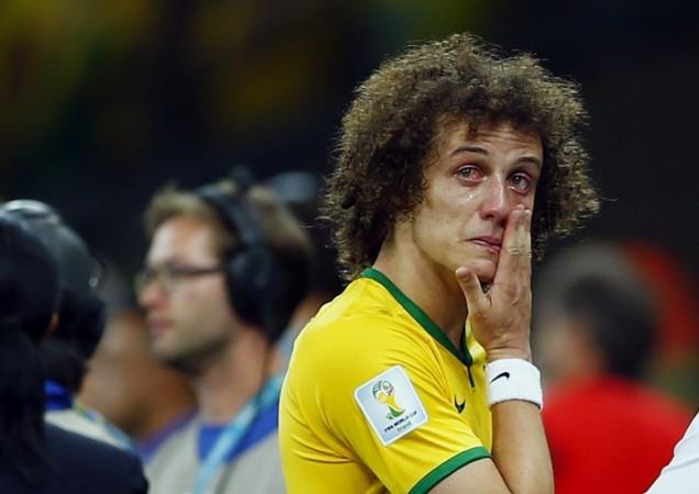 Brazil's David Luiz cries after his team lost to Germany in their World Cup semifinals clash. David Luiz