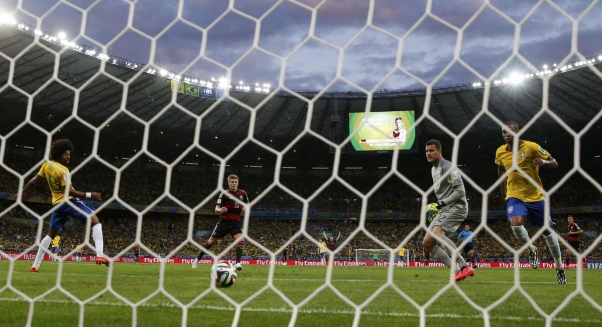 Germany's Toni Kroos scores their fourth goal during their 2014 World Cup semi-finals against Brazil at the Mineirao stadium in Belo Horizonte Brazil vs Germany