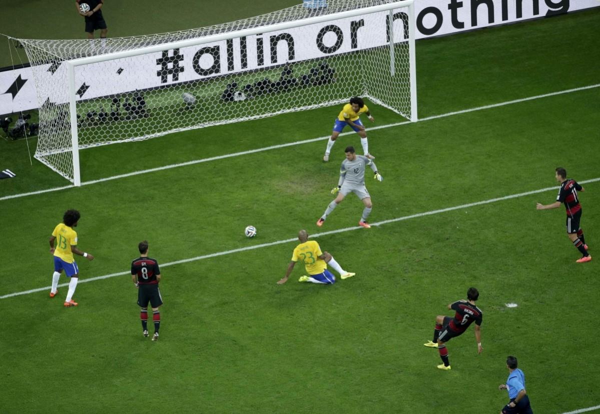 Germany's Sami Khedira scores a goal during their 2014 World Cup semi-finals against Brazil at the Mineirao stadium in Belo Horizonte Brazil vs Germany