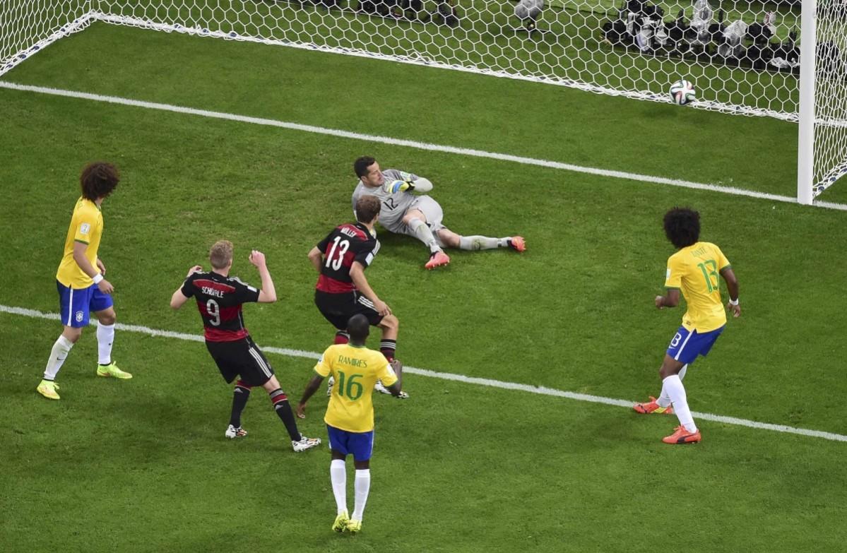 Germany's Andre Schuerrle scores their sixth goal during their 2014 World Cup semi-finals against Brazil at the Mineirao stadium in Belo Horizonte Brazil vs Germany
