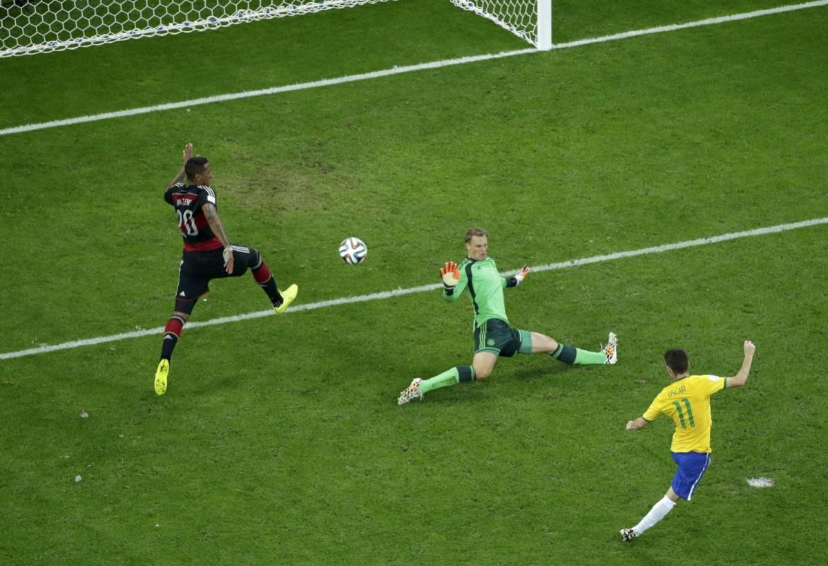Brazil's Oscar scores brazil's only goal during their 2014 World Cup semi-finals against Germany at the Mineirao stadium in Belo Horizonte Brazil vs Germany