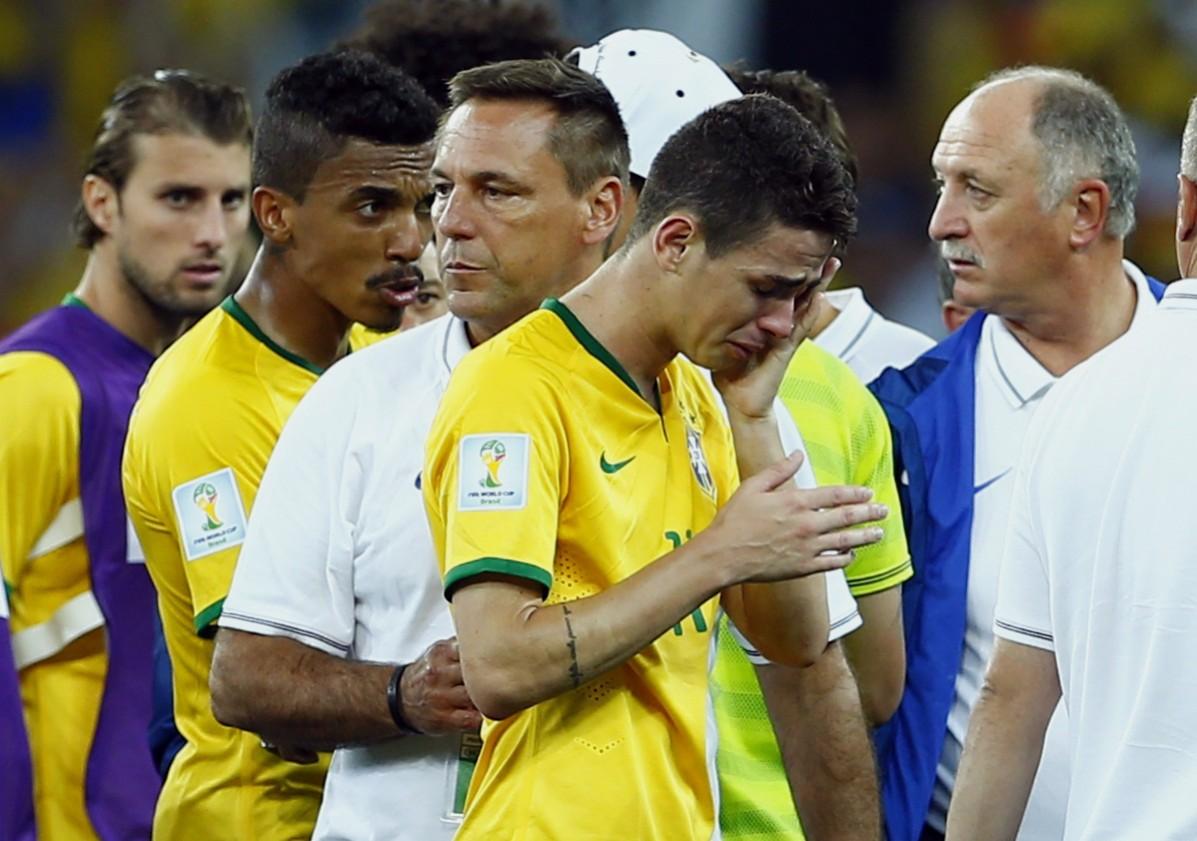 Brazil's Oscar cries after they lost to Germany in their 2014 World Cup semi-finals at the Mineirao stadium in Belo Horizonte Brazil vs Germany