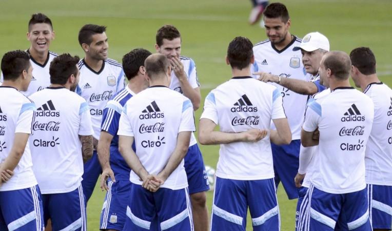 Argentina's national soccer team coach Sabella talks to his players during a training session in Vespasiano Argentina