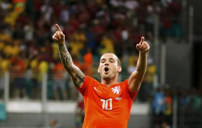 Wesley Sneijder of the Netherlands celebrates in the World Cup. Wesley Sneijder
