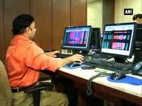 Sensex gains 400 points, Nifty stable at 7,700 as markets laud Modi's budget