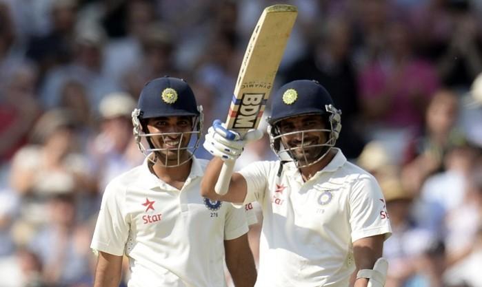 Mohammed Shami celebrates after completing his half-century as batting partner Bhuvneshwar Kumar looks on Bhuvneshwar Kumar Mohammed Shami India