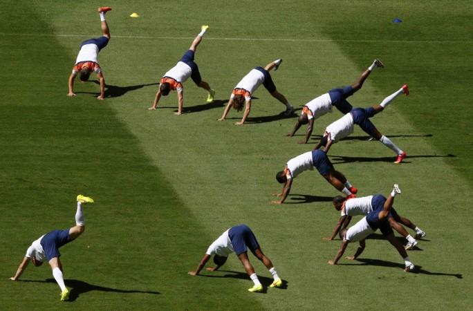 Netherlands' national soccer team players warm up during a training session ahead of their third place play offl match against Brazil at the Brasilia National stadium in Brasilia Netherlands