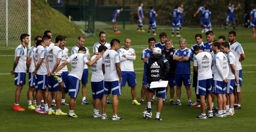 Argentina's coach Sabella talks to players during a training session ahead of their 2014 World Cup final match against Germany in Vespasiano Argentina