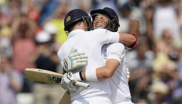 England batsman Joe Root celebrates with James Anderson after completing his century in the first Test against India Joe Root James Anderson England