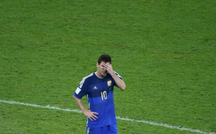 Argentina's Messi reacts after his team being defeated from Germany in their 2014 World Cup final at the Maracana stadium in Rio de Janeiro Lionel Messi