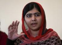 Pakistani schoolgirl activist Malala Yousafzai speaks during a meeting with the leaders of the #BringBackOurGirls Abuja campaign group, in Abuja