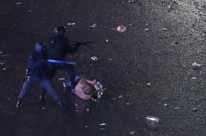 Argentina's fans clash with riot police after Argentina lost to Germany in 2014 World Cup final soccer match in Brazil, at a public square viewing area in Buenos Aires Argentina's fans clash with riot police after Argentina lost to Germany in 2014 World Cup final soccer match in Brazil, at a public square viewing area in Buenos Aires