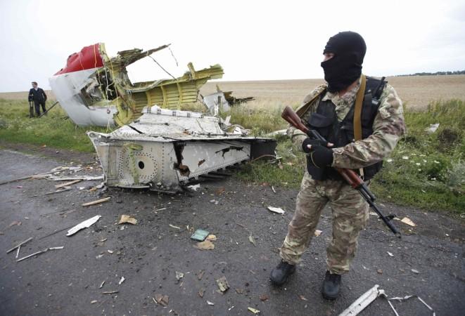 A team of international observers set to investigate the alleged downing of the Malaysian Airlines Flight MH17 have been blocked by 'drunk' rebels.