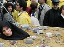 An Iranian woman protesting over death by stoning in Brussels
