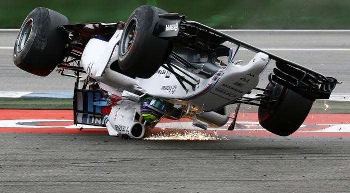 Williams' Felipe Massa crashes with his car in the first corner after the start of the German GP. Felipe Massa Crash