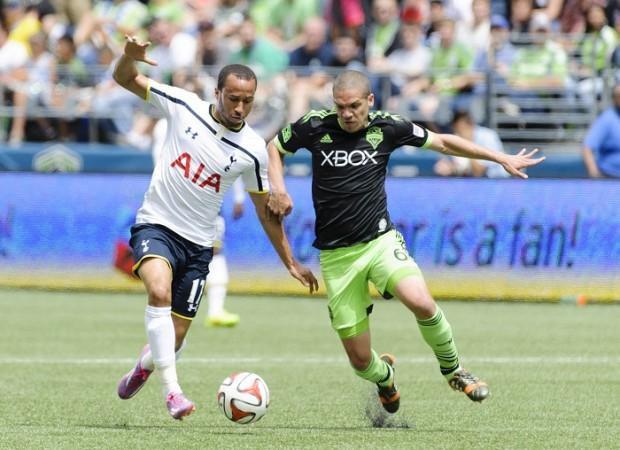 Tottenham Hotspur midfielder Andros Townsend and Seattle Sounders FC midfielder Osvaldo Alonso. Andros Townsend