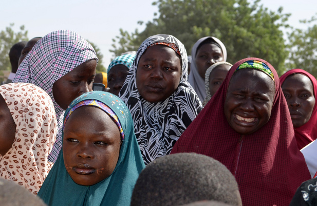 Mothers of kidnapped school girls react during a meeting with the Borno State governor in Chibok, Maiduguri, Borno State, April 22, 2014.
