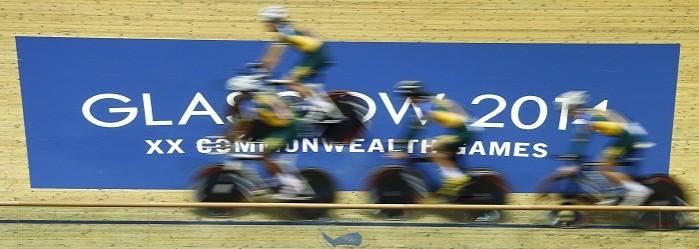 Cyclists warm up before the first day of competition in the 2014 Commonwealth Games. CWG