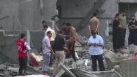 gazans-survey-damage-after-israeli-strikes