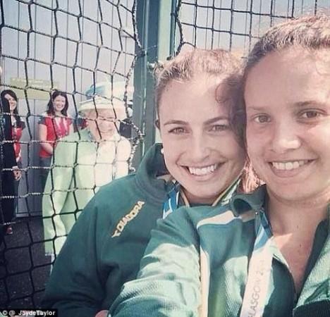 Queen phot-bombing a selfie.