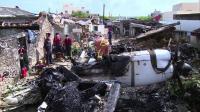 locals-remember-plane-crash-as-cleanup-starts-in-taiwan