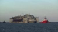 italys-wrecked-cruise-ship-prepares-to-dock-in-genoa