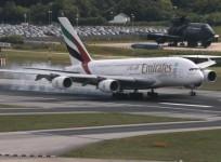 An Emirates Airbus A380 lands on the runway at Manchester Airport at Manchester Airport, northern England June 25, 2013
