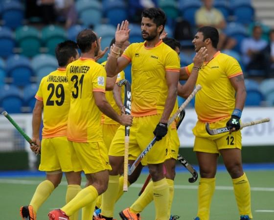 Indian hockey team celebrates after scoring against Scotland in the Commonwealth Games. Indian Hockey Team